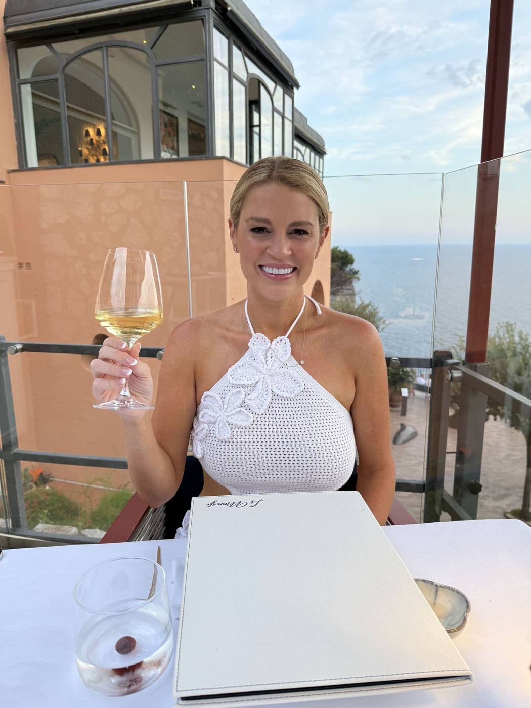 Savannah Sikes raising a glass