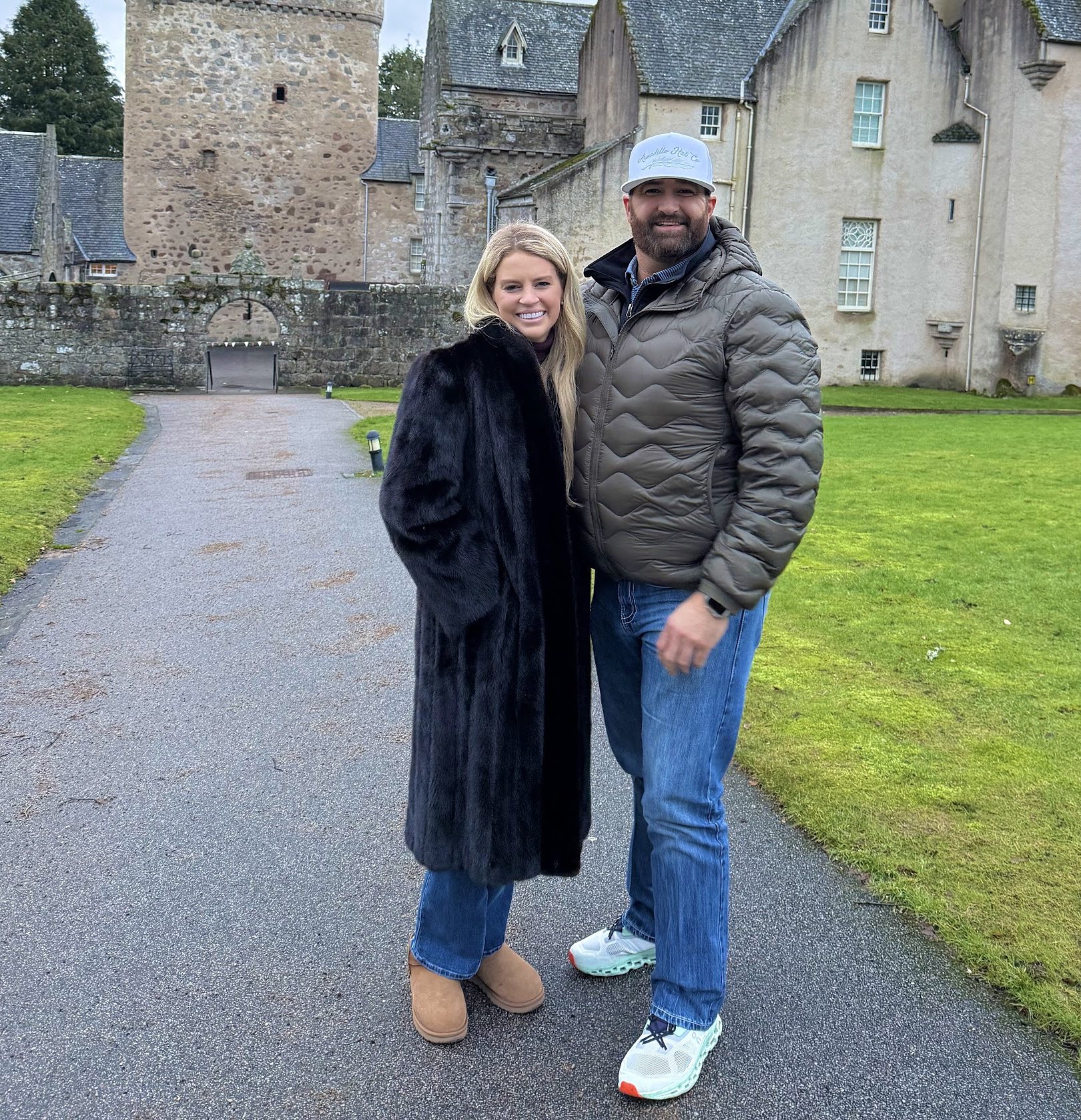 Savannah Sikes and David by a castle in Scotland
